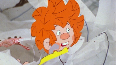 Der Pumuckl geht in die Schule. Als er in einen Papierkorb hüpft, bleibt er an einem Kaugummi kleben und wird sichtbar. | Bild: BR/Infafilm GmbH/Original-Entwurf "Pumuckl"-Figur: Barbara von Johnson