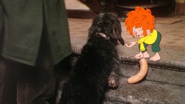 Der Pumuckl vereinbart mit Meister Eder, dass er wie ein Hund bellt, wenn jemand etwas vergisst oder verliert. Dass das keine gute Idee war, stellt sich bald heraus. | Bild: BR/Infafilm GmbH/Original-Entwurf "Pumuckl"-Figur: Barbara von Johnson