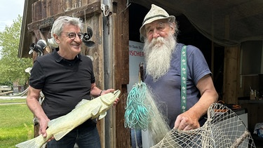 Simon Rauch (rechts) ist der "Prince of Wels", ein Urgestein der Fischer am Ammersee. | Bild: BR/megaherz gmbh/HP Fischer