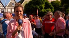 BR-Korrespondentin Nicole Remann beim Zielort der BR-Radltour in Neustadt an der Aisch. | Bild: BR