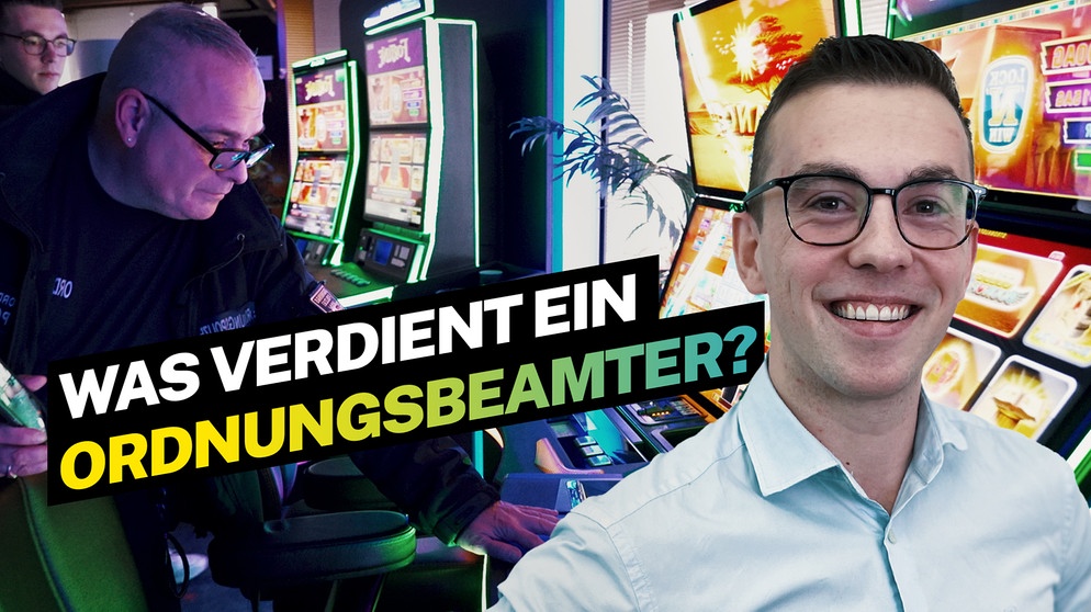 Männer vor einem Spielautomaten | Bild: BR