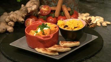 "Butter Chicken“ mit Gewürz-Rosinen-Reis und Naan-Pfannenbrot | Bild: Wir in Bayern