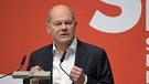 30.11.2024, Brandenburg, Potsdam: Bundeskanzler Olaf Scholz (SPD) spricht als Kandidat bei der Wahlkreisdelegiertenkonferenz zur Aufstellung der SPD-Wahlkreiskandidaten seines Bundestagswahlkreises in Potsdam vor Parteimitgliedern.  | Bild: dpa-Bildfunk/Michael Bahlo