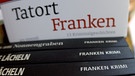 Bücherrücken mit der Aufschrift "Franken Krimi" | Bild: picture-alliance/dpa