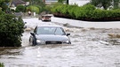 Ein Auto im Hochwasser | Bild: Bayerischer Rundfunk 2024