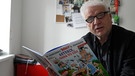 Wachtveitl mit Asterix-Comic | Bild: Bayerischer Rundfunk 2024