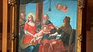 Ein Bild des Barock? Das Expertenteam von "Kunst + Krempel" schaut sich das Gemälde der "Heiligen Familie" genauer an und sieht "süße" Gesichter, was auf eine andere Epoche schließen lässt. In der Besitzerfamilie sorgt das Werk für Diskussionsstoff ... | Bild: Bayerischer Rundfunk 2023