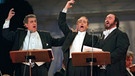 Die "Drei Tenöre" Placido Domingo (v.l.), Jose Carreras und Luciano Pavarotti bei einem Auftritt am 29.06.1996 in Tokio. | Bild: picture-alliance/dpa