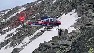 Ein Hubschrauber der österreichischen Polizei  | Bild: BR