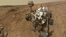 Marsrover "Curiosity" auf dem Mars | Bild: picture alliance / dpa | Mars Rover Celebrates / Handout