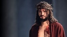 "In erster Linie ist Jesus für mich ein mutiger Mann", sagt Jesus-Darsteller Rochus Rückel im Gespräch mit dem BR.  | Bild: Passionsspiele Oberammergau 2022/ Birgit Gudjonsdottir