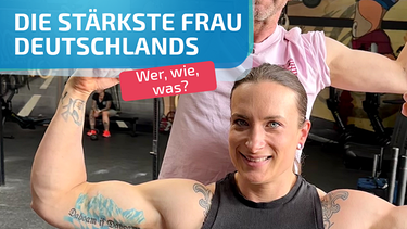 Andi von den Woidboyz und Strongwoman Sandra zeigen ihre Muskeln | Bild: Andreas Weindl 