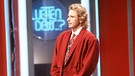 Thomas Gottschalk bei seiner ersten Moderation von "Wetten, dass...?!" im Jahr 1987. | Bild: picture-alliance / dpa | Schmitt