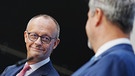 Friedrich Merz (l), CDU-Bundesvorsitzender und Unionsfraktionsvorsitzender, und Markus Söder, CSU-Vorsitzender und Ministerpräsident von Bayern, geben eine Pressekonferenz zur Frage um die Kanzlerkandidatur der Union. | Bild: dpa-Bildfunk/Kay Nietfeld