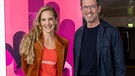 Karl-Theodor zu Guttenberg und Caro Matzko im Live-Podcast beim BR Podcastfestival.  | Bild: Ludwig Noack