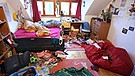 Ein unaufgeräumtes Kinderzimmer | Bild: picture-alliance/dpa