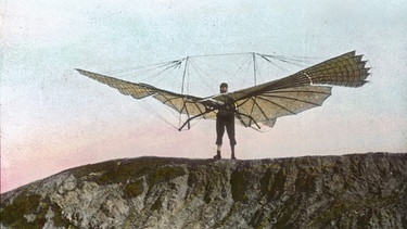 Otto Lilienthal mit "Normal-Segelapparat". Handkoloriertes Glasdiapositiv. 1896. | Bild: picture-alliance / brandstaetter images/Österreichisches Volkshoc | Anonym