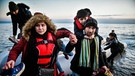 Flüchtlinge gehen auf Lesbos an Land | Bild: picture Alliance/ZUMA Press
