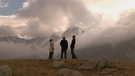 3 Menschen jodeln auf dem Berg | Bild: BR/Maximage