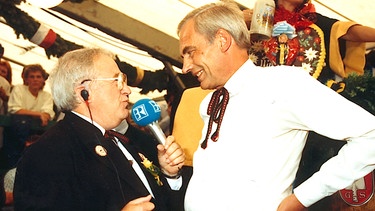 Michael Stiegler und Oberbürgermeister Georg
Kronawitter beim Anstich auf dem Oktoberfest, 1980er
| Bild: BR, Historisches Archiv, Sessner