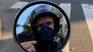 Korrespondent Ivo Marusczyk auf seinem Motorrad mit Mundschutz | Bild: privat