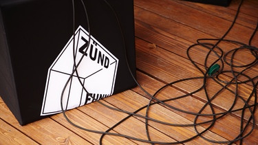Würfel mit Zündfunk-Logo und Kabel | Bild: BR/Denis Pernath Fotografie