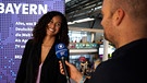 Lijana Kaggwa im Interview am BR-Stand bei den Medientagen in München 2022. | Bild: BR